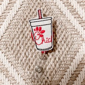 Chick-Fil-A badge reel